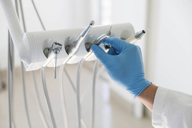 Professional Wisdom Tooth Removal technician working in Collier County County, FL